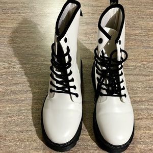 Unload your white laced combat boots